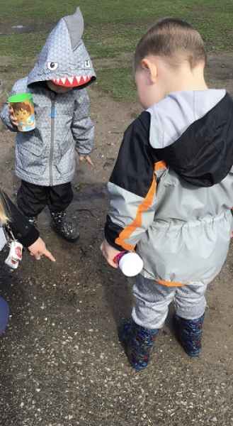 kids looking for worms