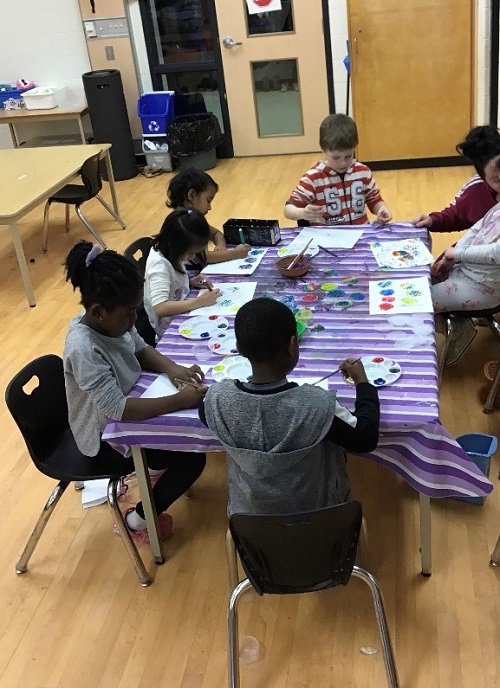 Group of children at the art table