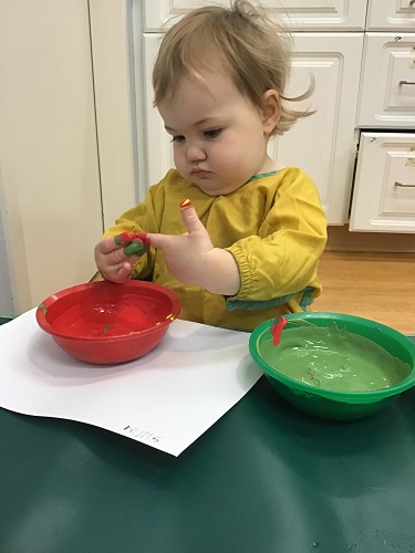Child playing with paint
