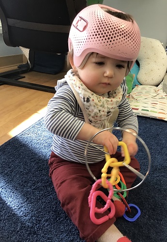 child holding toy