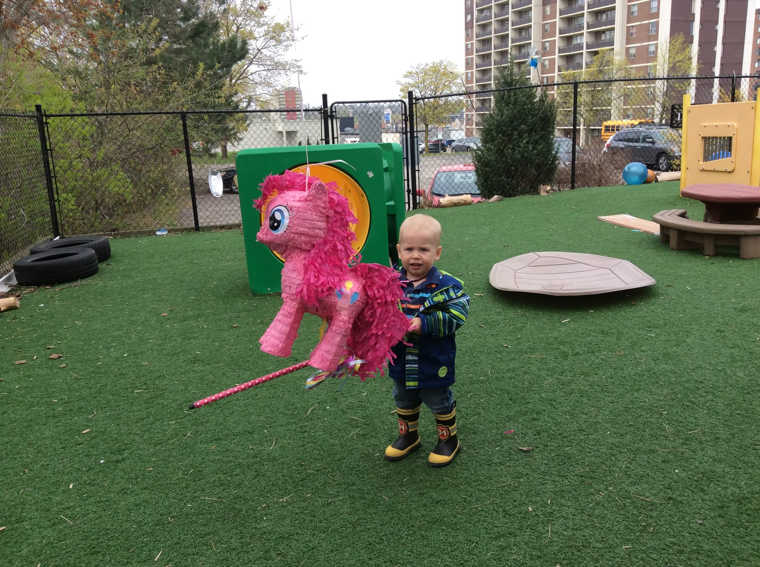 boy swinging at a pinata