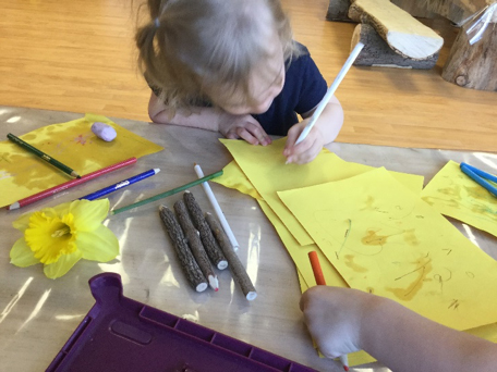 girl drawing a flower