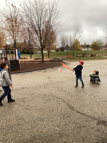 school age child batting
